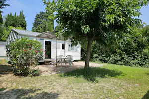 Camping Les Micocouliers - Mobilheim im Grünen auf dem Campingplatz