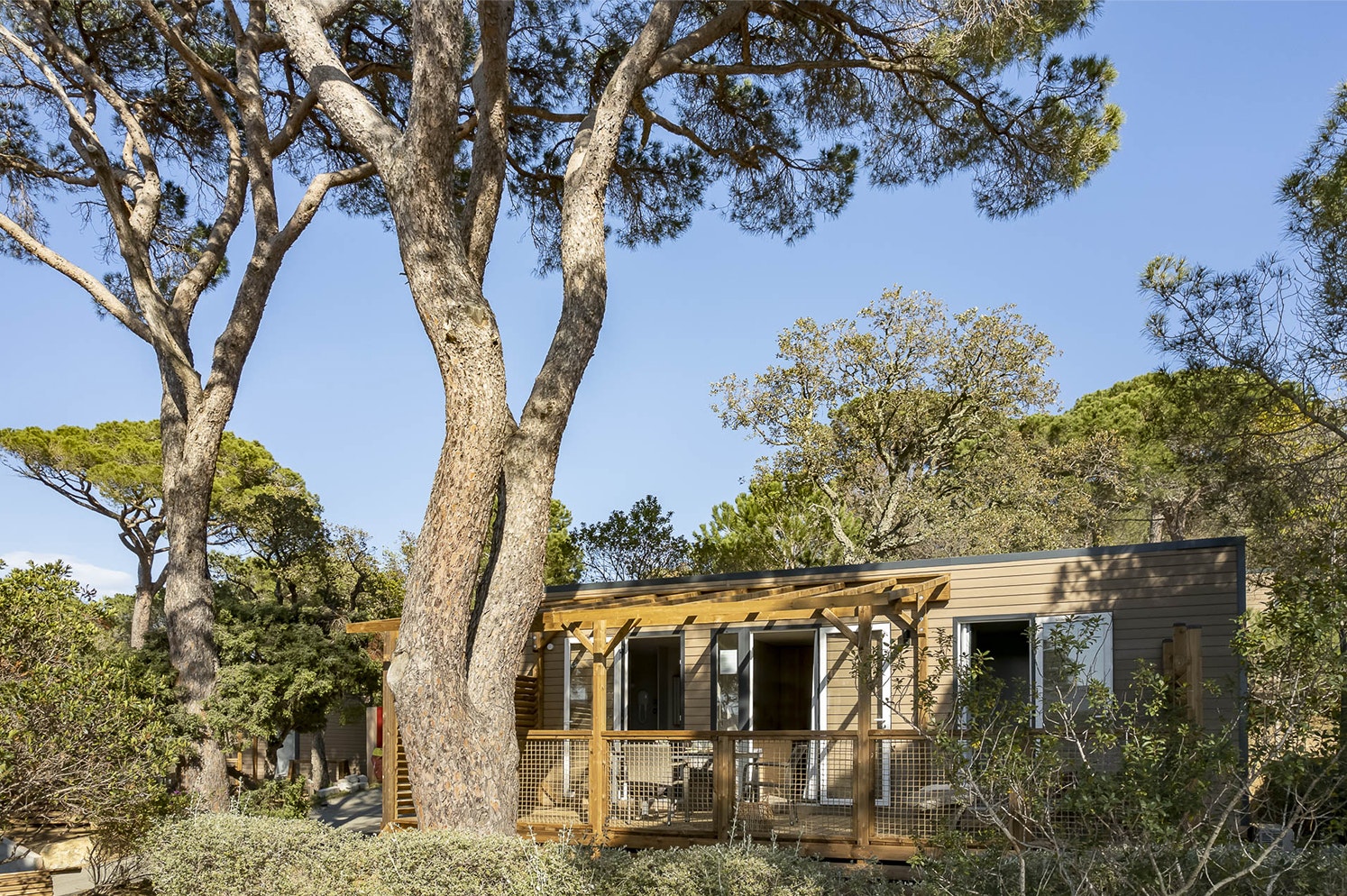 Yelloh! Village Les Tournels  Camping Les Tournels  - Mobilheim mit Terrasse auf dem Campingplatz