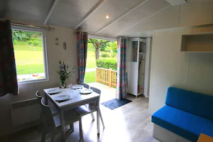 Camping Maisonneuve Dordogne - Wohnraum im Mobilheim