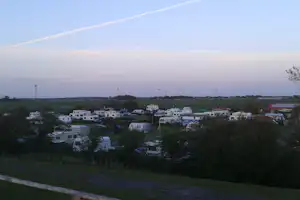 Camping Nordstrand - Stellplatz vom Campingplatz im Grünen bei Sonnenuntergang