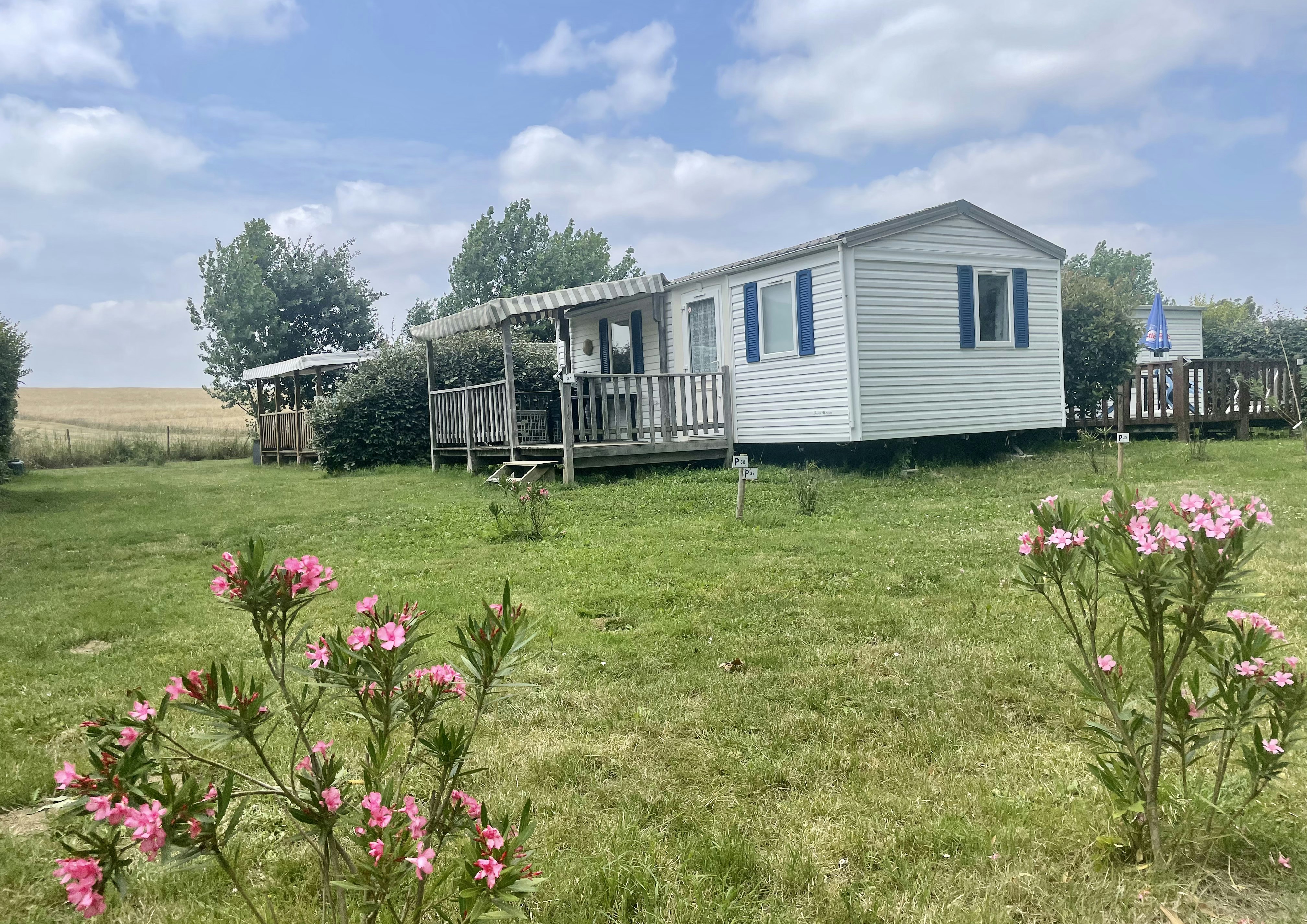 Camping O’ Beau Laurier  - Mobilheim mit Terrasse auf dem Campingplatz
