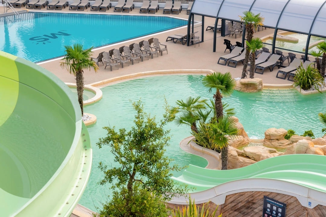 Camping Club MS La Côte Sauvage - Wasserpark mit mehreren Becken und Rutschen