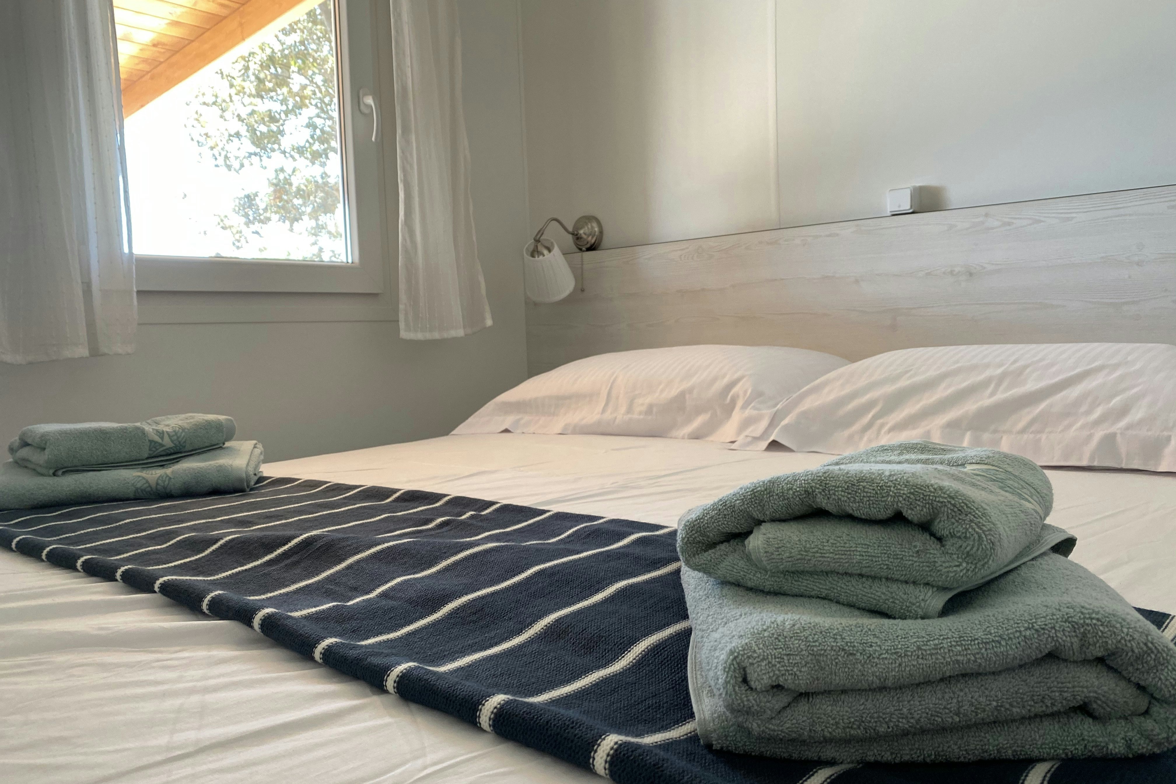 Camping Piccolo  Campsite Piccolo - Schlafzimmer eines Mobilheims