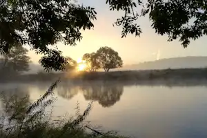 Camping Pont de Deulin - Der Sonnenaufgang über dem Fluss