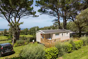 Flower Camping Le Port de la Chaine Camping Port la Chaîne - Mobilheim mit Terrasse auf dem Campingplatz
