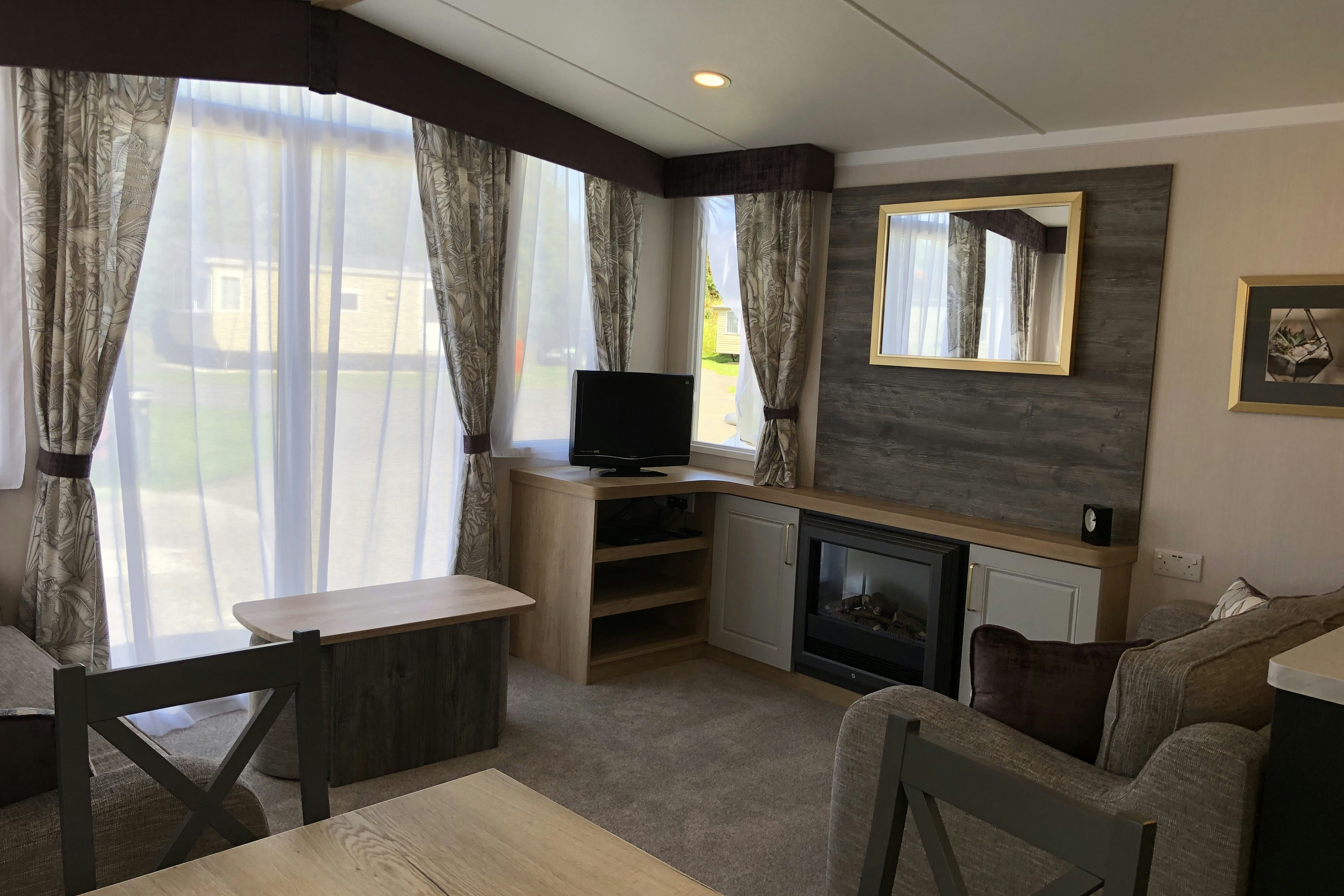 Robin Hood Caravan Park  Camping Robin Hood  - Innenansicht eines Mietwohnwagens auf dem Campingplatz