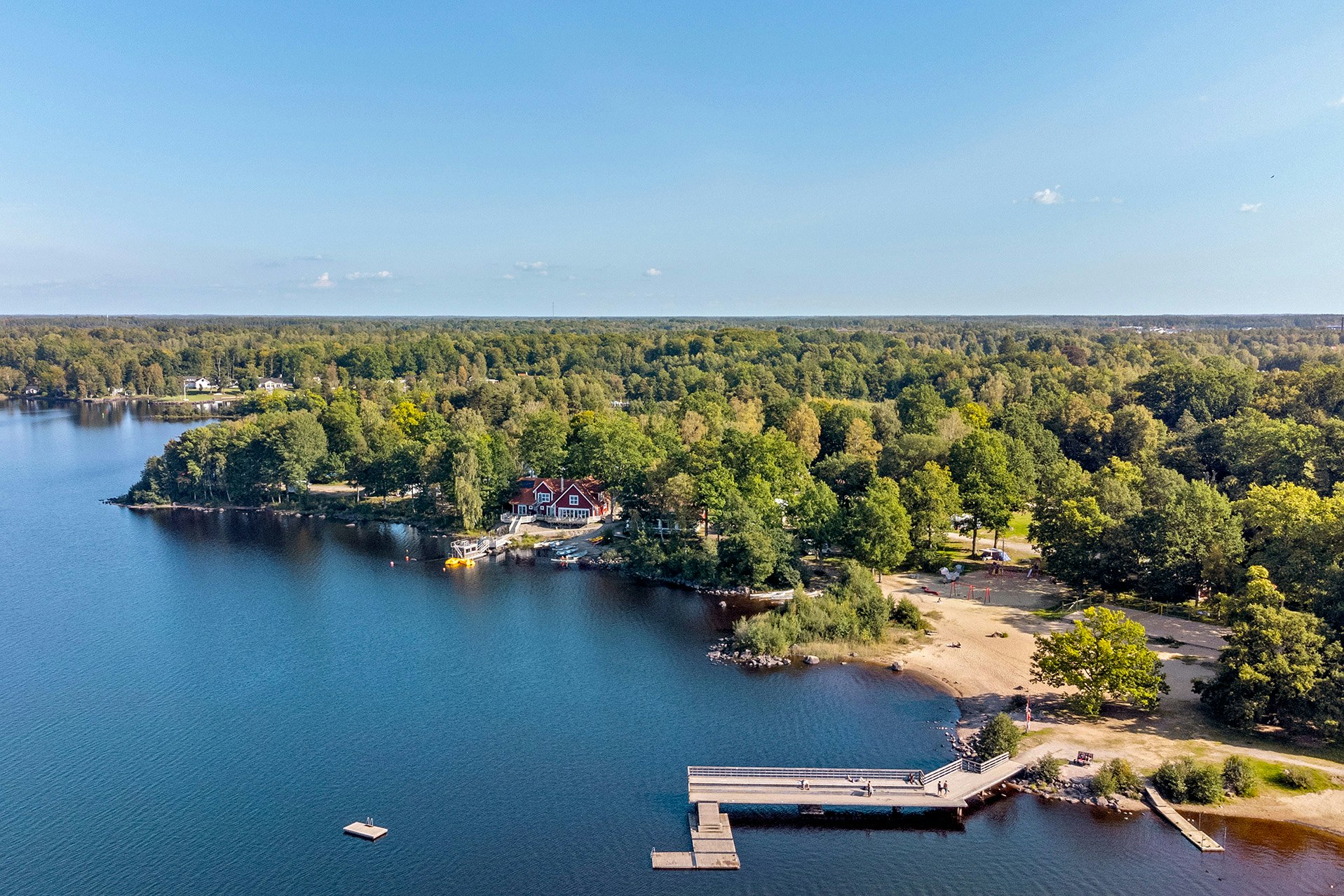 First Camp Sjöstugan – Älmhult  Camping Sjöstugan  - Campingplatz aus der Vogelperspektive