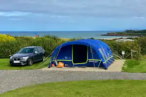 Tyddyn Isaf Caravan Park - Zeltplatz auf gekiesten Untergrund
