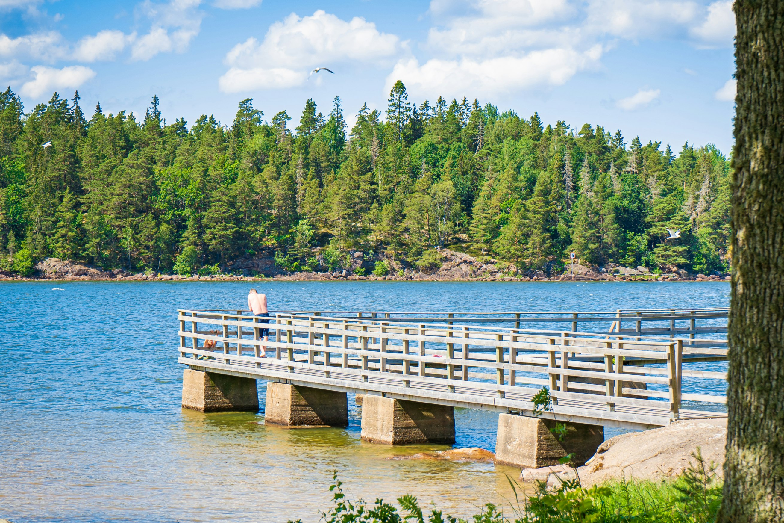 Ursand Resort & Camping  Camping Ursand - Blick auf den Badesteg am See