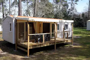 Camping Vert Bord'Eau - Mobilheim mit Veranda auf dem Campingplatz