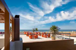 Camping Village Garden Paradiso - Sonnenterrasse mit Meerblick