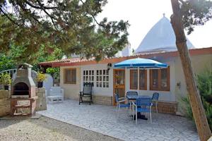 Camping Villaggio Pineta al Mare - Mobilheim mit eigener Grillstelle auf dem Campingplatz