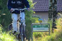 Camping Troisvierges - Fahrrad Fahrer auf dem Campingplatz Gelände