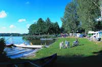 Camping Zwenzower Ufer  -  Wohnwagen- und Zeltstellplatz vom Campingplatz mit direktem Zugang zum See