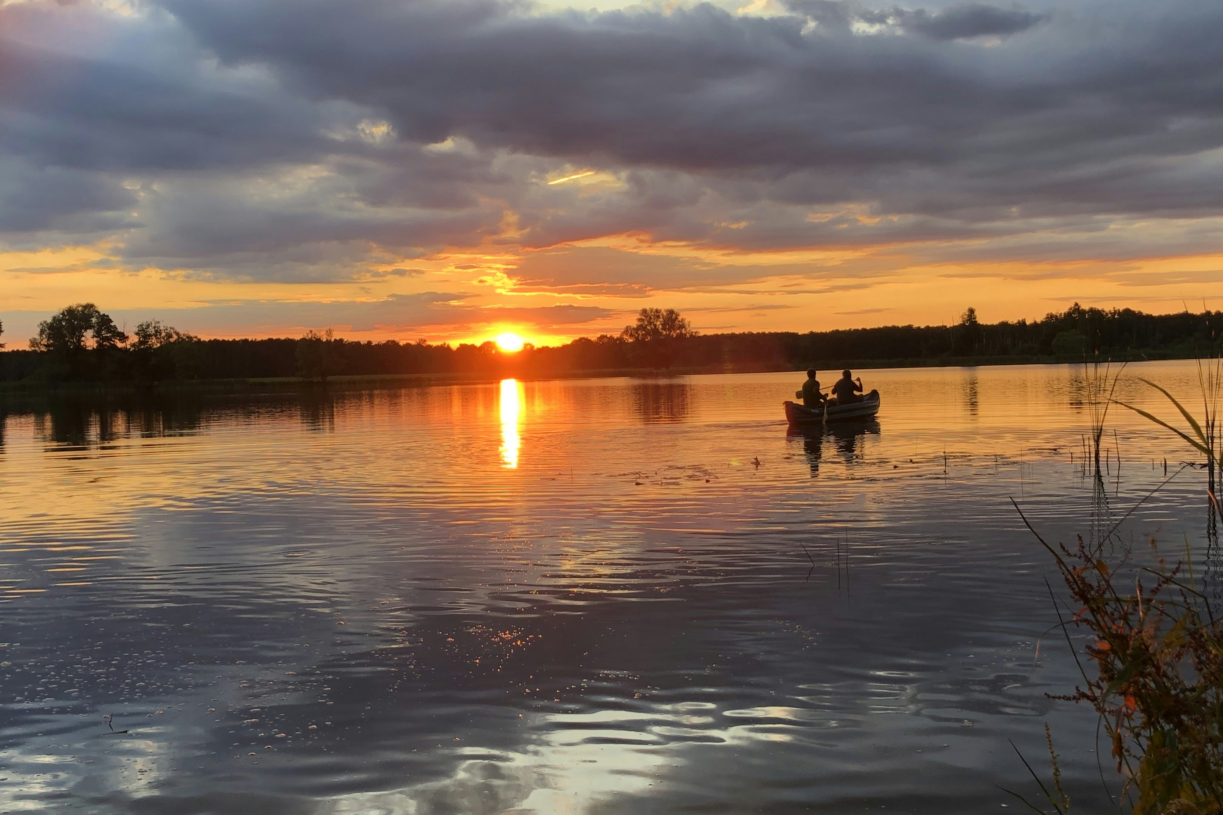 Campingpark Halbinsel Raatsch - Sonnenuntergang über dem Wasser