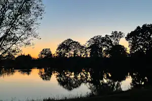 Häppy Life - Blaue Lagune Twist Campingplatz Blaue Lagune - Sonnenuntergang über dem See