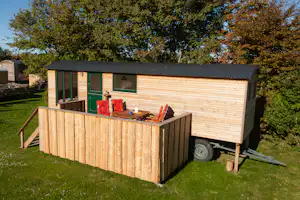Campingplatz Flüggerteich - Bauwagen Leuchtturmblick auf Fehmarn