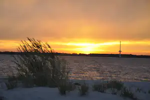 Campingplatz Krautsand am Elbstrand - Sonnenuntergang vom Strand aus gesehen