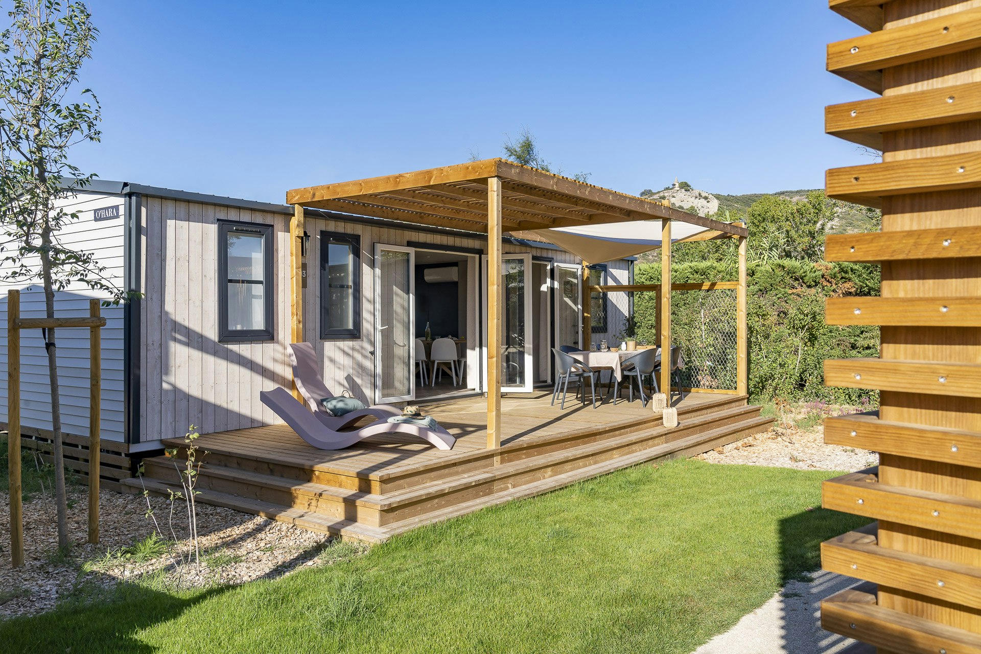 Camping Sandaya Île des Papes  Campéole Île des Papes - Mobilheim mit Terrasse auf dem Campingplatz