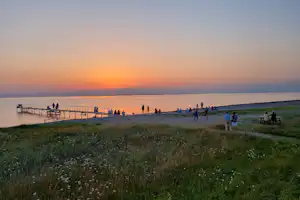 CampOne Assens Strand - Sonnenuntergang über dem Strand