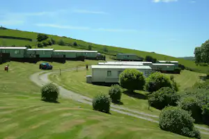 Castle Point Caravan & Camping Site - Mobilheime vom Campingplatz auf grüner Wiese