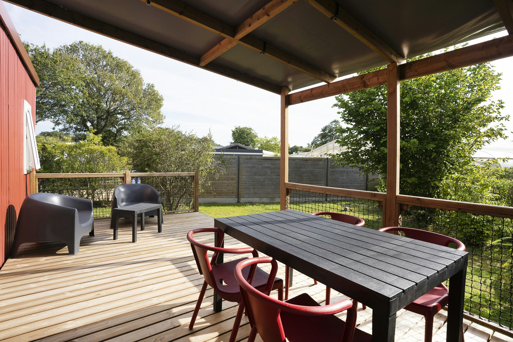 Domaine du Mès  - Mobilheim mit Terrasse auf dem Campingplatz
