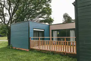 Domaine du Moulin Neuf - Mobilheim mit Terrasse auf dem Campingplatz