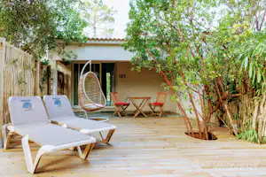 Domaine naturiste de Bagheera - Terrasse der Minivilla