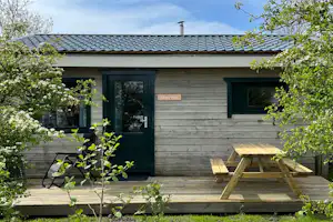 Duincamping De Lepelaar - Mobilheim mit Terrasse auf dem Campingplatz