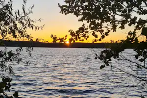 Ferienhof Löschebrand - Sonnenuntergang über dem See