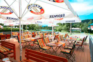 FKK Camping Müllerhof - Restaurant vom Campingplatz mit Terrasse und Blick auf den See