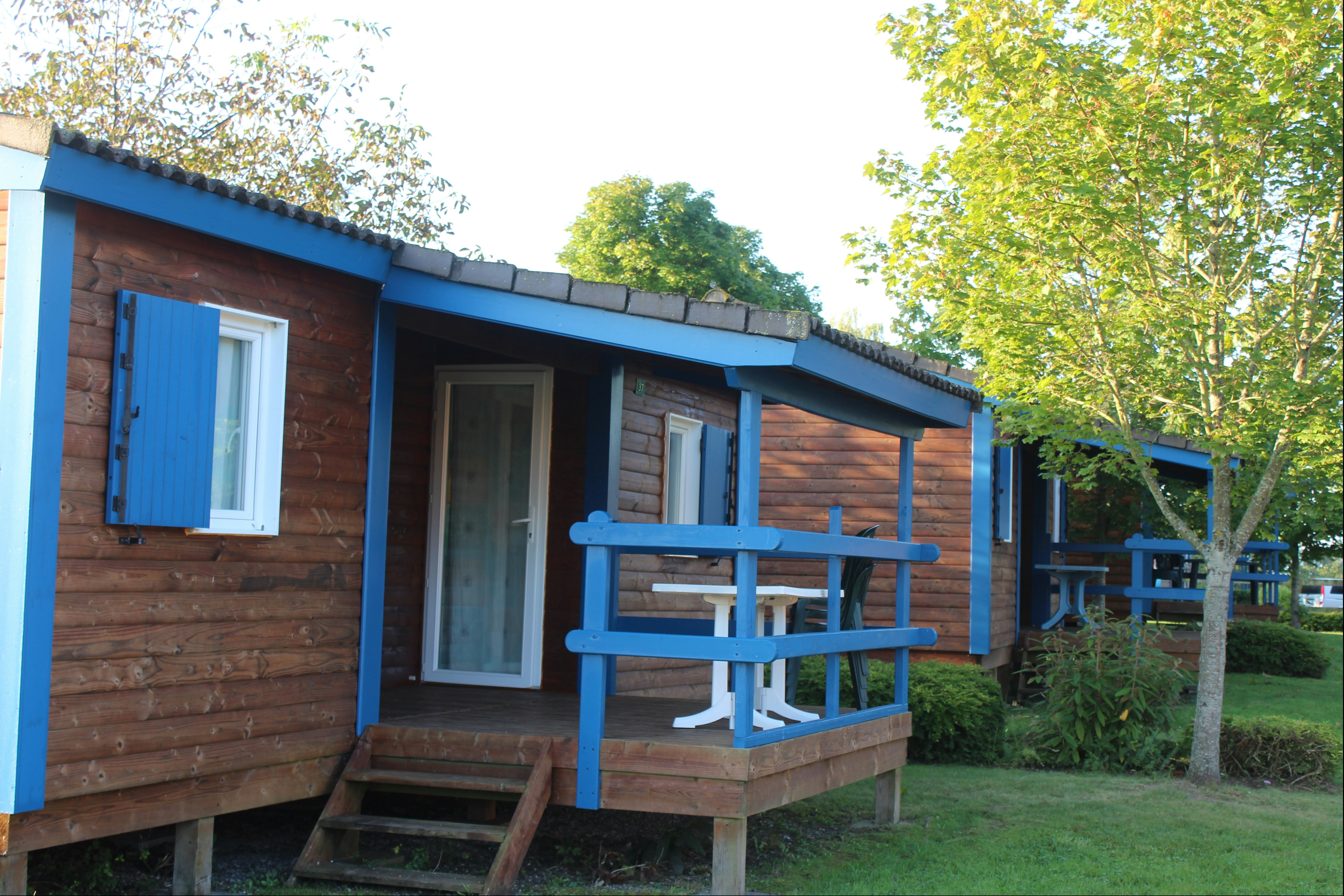 Flower Camping L' Oasis - Terrasse eines Ferienhauses