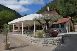 Flower Camping Le Peyrelade - Restaurant Terrasse auf dem Campingplatz