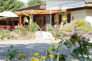 Flower Camping Les 3 Ours - Restaurant vom Campingplatz mit Terrasse