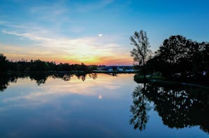 Camping des Étangs Flower Camping Les Étangs - Sonnenuntergang über dem See