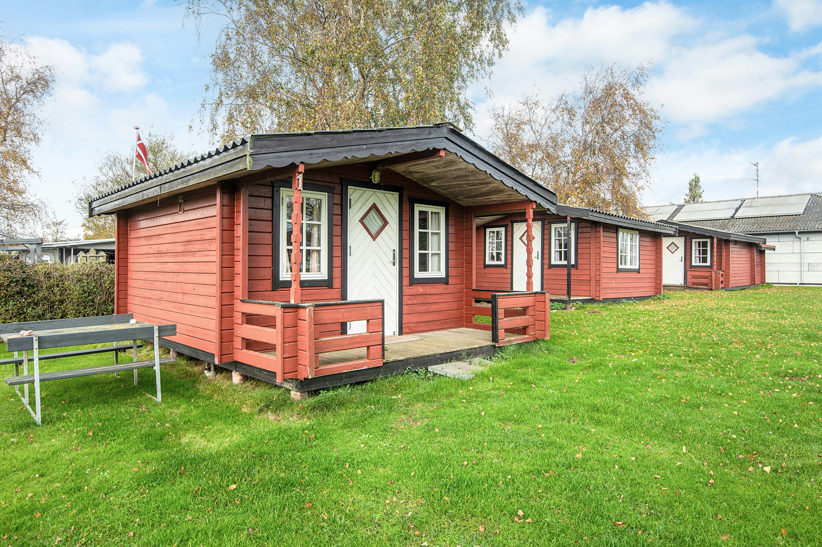 Gåsevig Strand Camping  - Mobilheim mit Terrasse auf dem Campingplatz
