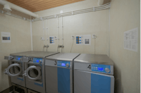 Hanko Camping Silversand - Wäscheraum mit Waschmaschinen und Trocknern
