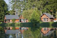 Huttopia Camping Rillé - Chalet mit Veranda im Grünen auf dem Campingplatz   mit Blick aufs Wasser