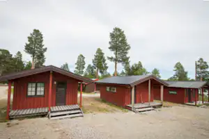 Johnsgård Turistsenter - Mobilheime mit Terrasse im Grünen auf dem Campingplatz