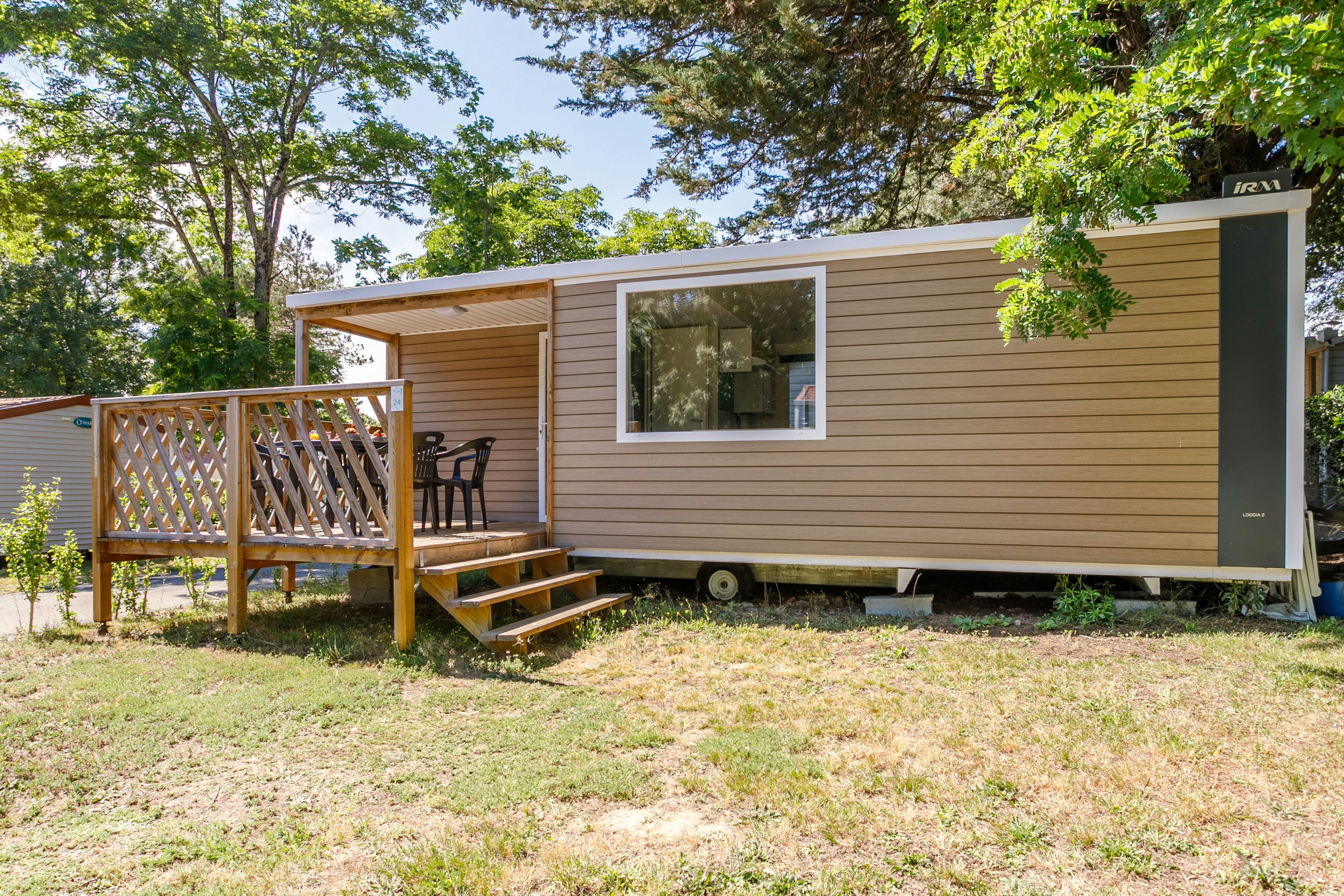 Le Parc de la Grève  - Mobilheim mit Terrasse auf dem Campingplatz
