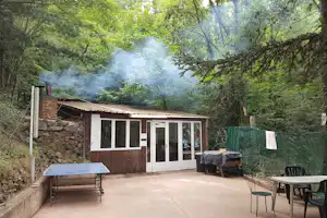 Le P'tit Bonheur - Gemeinschaftliche Terrasse auf dem Campingplatz