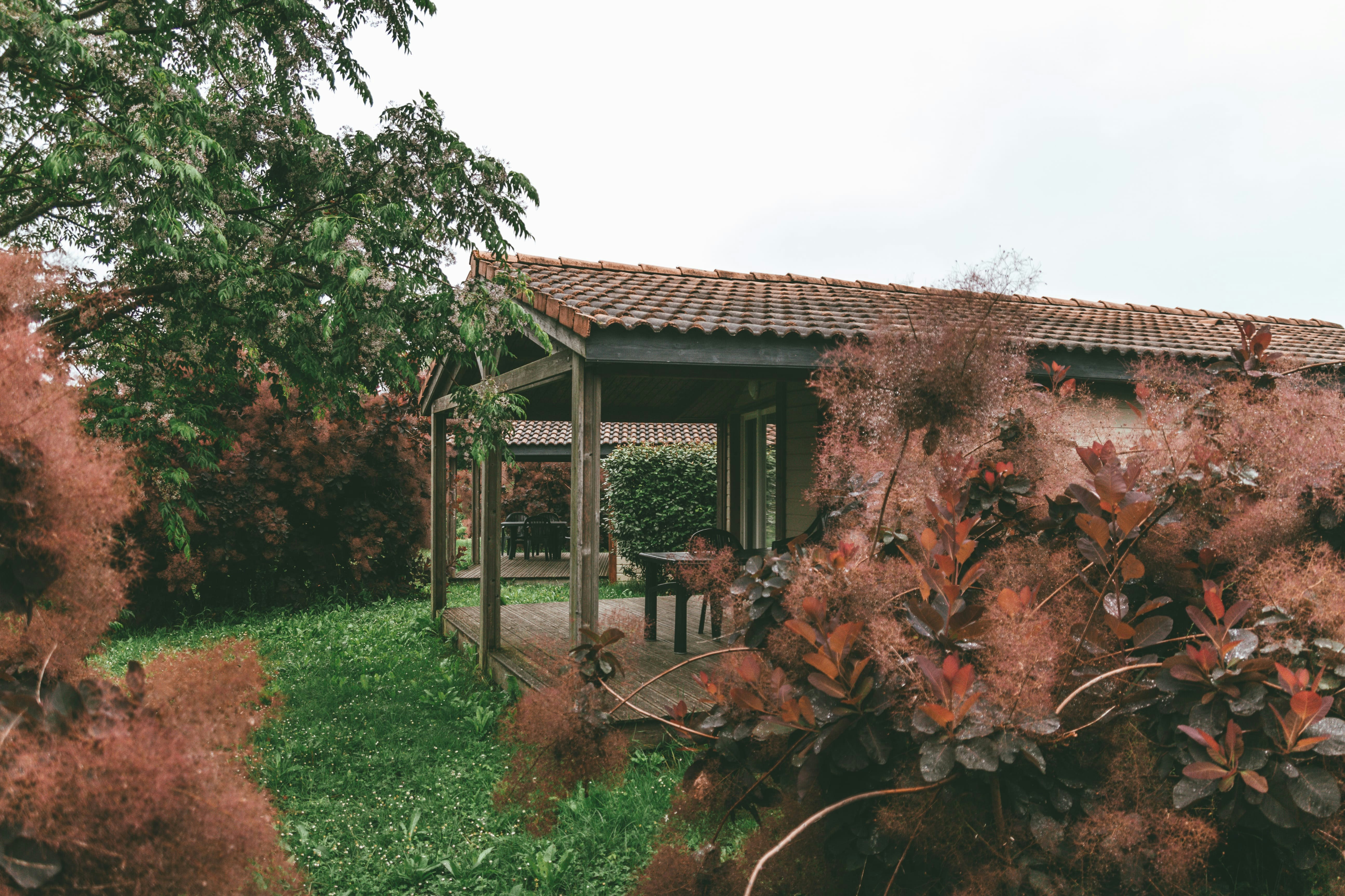 Les Hameaux des Lacs - Terres de France  - Mobilheim mit Terrasse auf dem Campingplatz