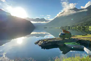 Mindresunde Camping - Sonnenaufgang hinter den Bergen