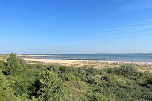 Minicamping 't Hof Welkom - Blick auf den Strand am Campingplatz