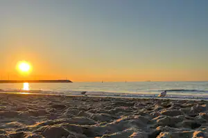 Minicamping 't Hof Welkom - Sonnenuntergang über dem Meer