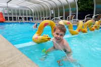 Randers City Camp  - Kind im Kinderbecken vom Pool auf dem Campingplatz