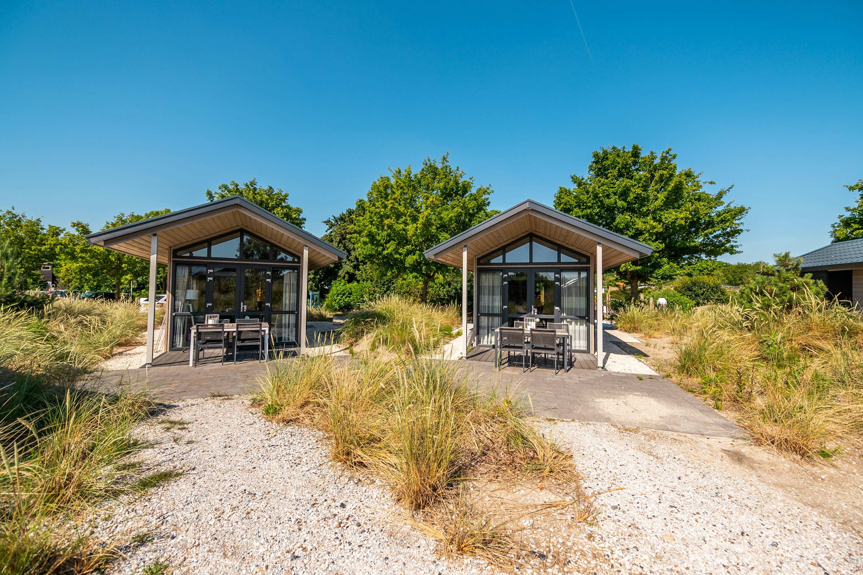EuroParcs Poort van Zeeland  Strandcamping De Quack - Mobilheime mit Terrasse auf dem Campingplatz