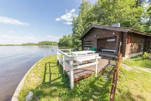 Tampere Camping Härmälä - Mobilheim vom Campingplatz mit Veranda und mit direktem Zugang zum See