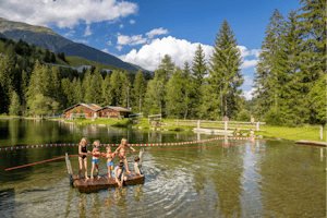 TCS Camping Disentis TCS-Camping Disentis - Badeteich auf dem Campingplatz
