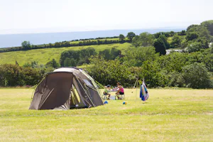 Tencreek Holiday Park - Zeltwiese direkt am Meer auf dem Campingplatz